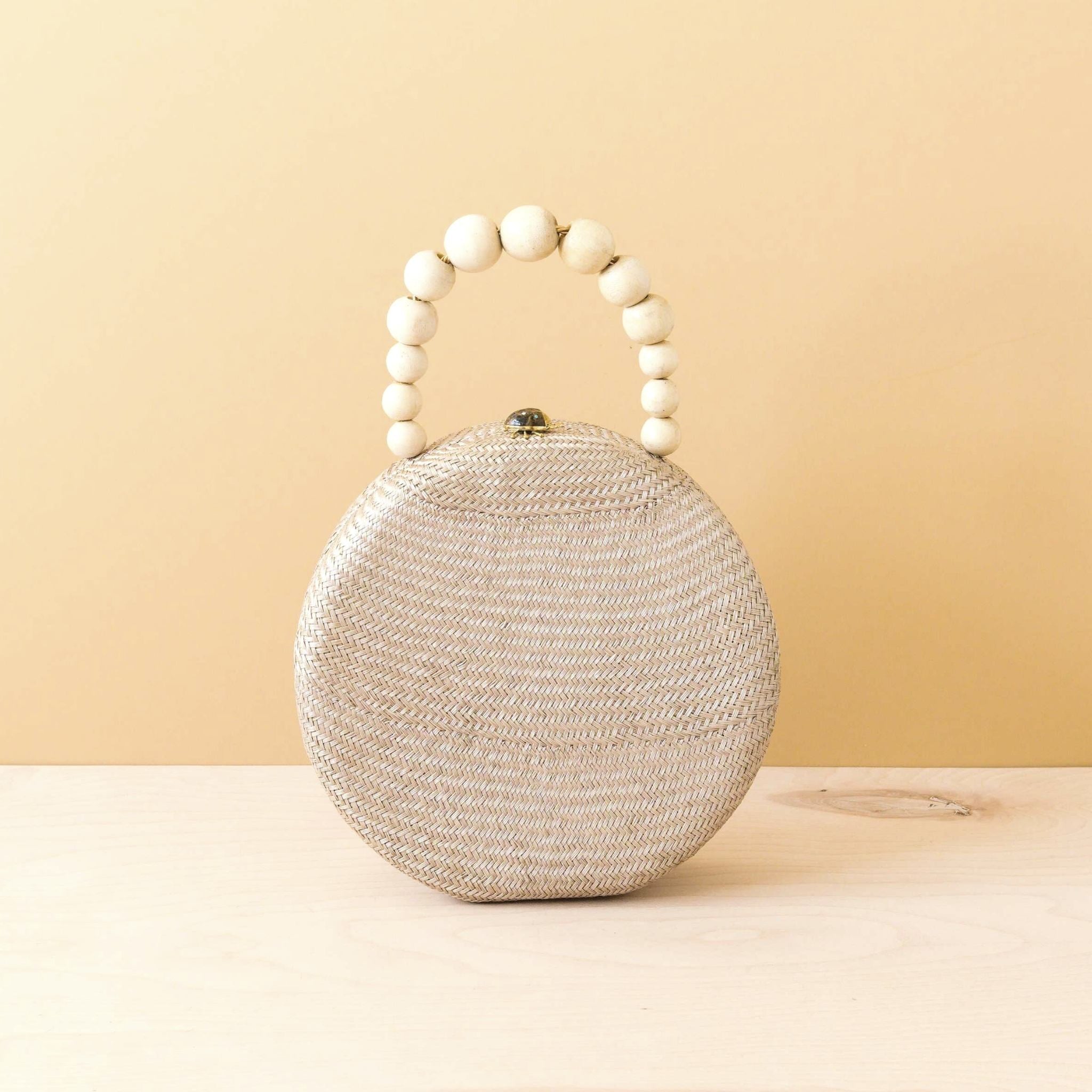 Round hot sale pearl bag