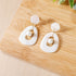 Earrings, Jewelry - Mother of Pearl Hollow Earrings with Pearl - White | LIKHÂ - LIKHÂ